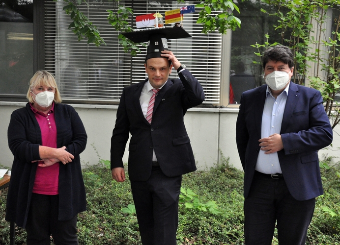 Prof. Virtanen, Prof. Boccaccini und Michael Höhlinger mit Doktorhut.